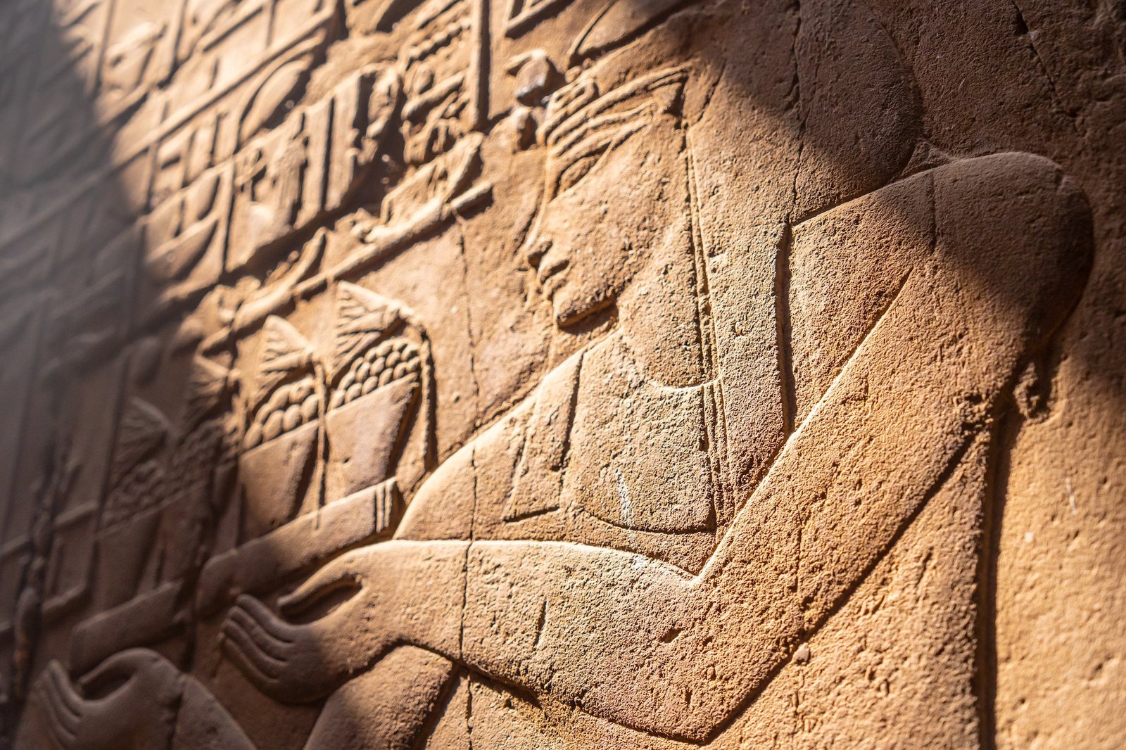 Detail of beautiful natural light on an ancient egyptian drawings inside the Luxor Temple