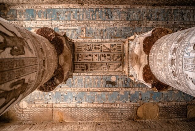 Old pillars and ancient Egyptian drawings on the columns of the Luxor Temple in Egypt